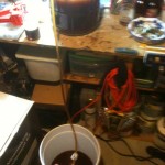siphoning from fermenting jug to bottling pail