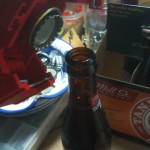 capping the freshly-bottled beer